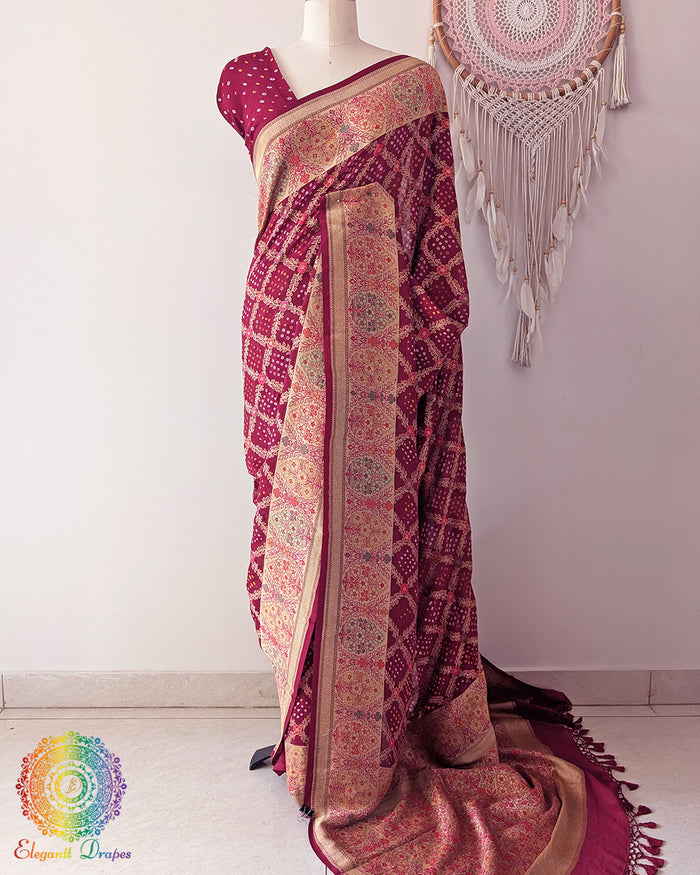 Maroon Banarasi khaddi georgette bandhani meenakari saree on mannequin showing full drape