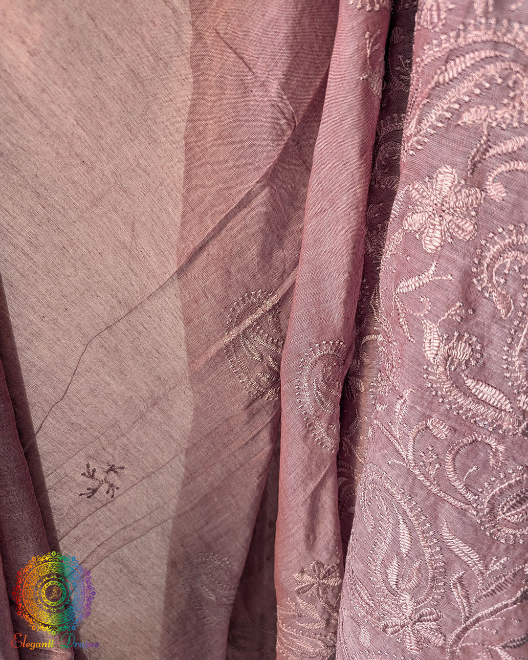 Close up of Chikankari-inspired paisley embroidery on mauve Bengal cotton saree