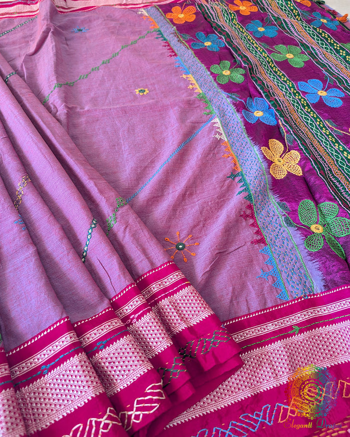 Mauve ilkal cotton fabric showcasing woven texture and handcrafted Lambani embroidery