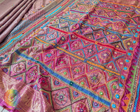 Mauve pure Kanjivaram silk saree with Lambani handwork palla view