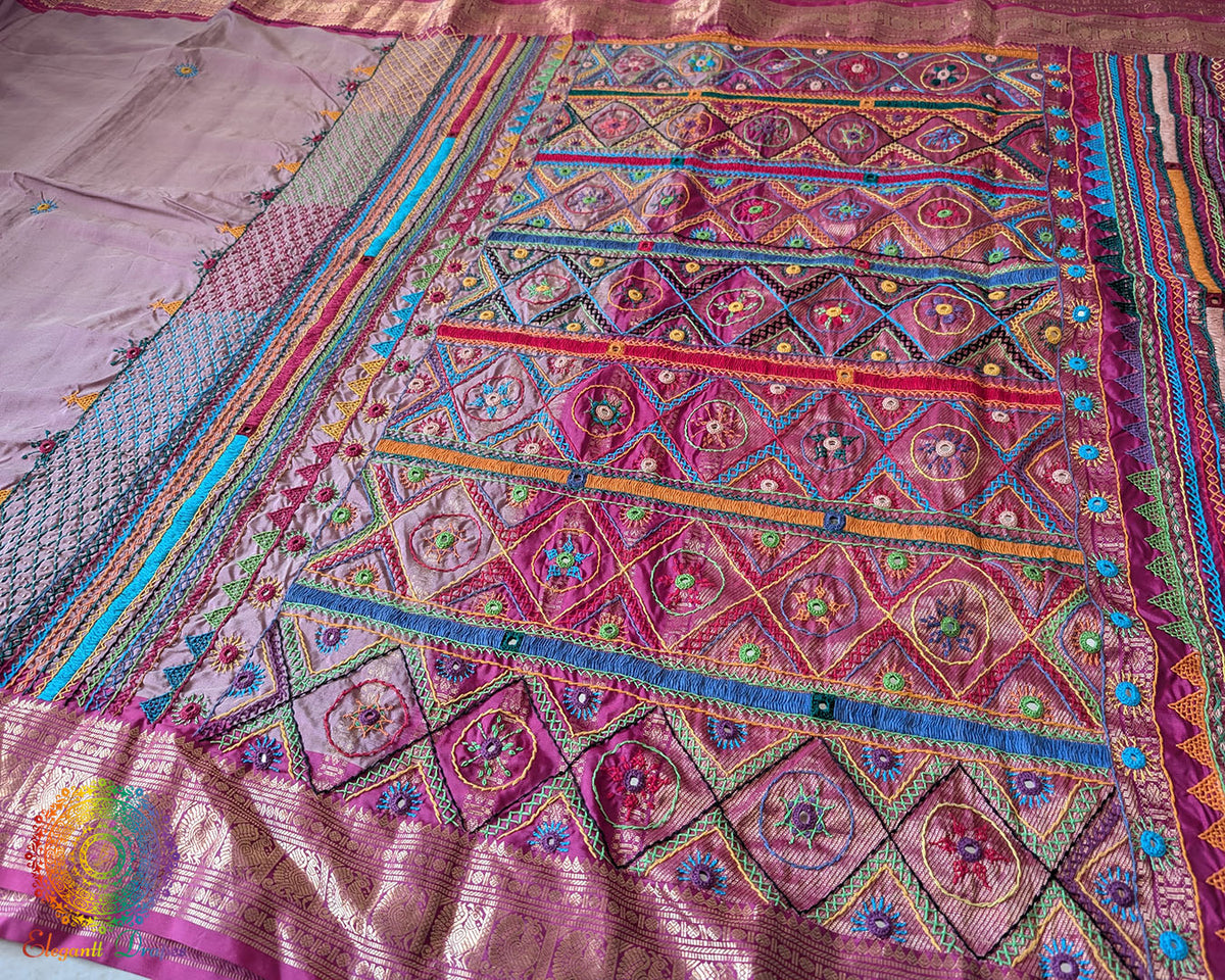 Mauve pure Kanjivaram silk saree with Lambani handwork full palla