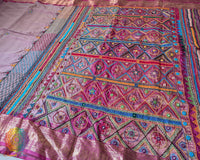 Mauve pure Kanjivaram silk saree with Lambani handwork full palla