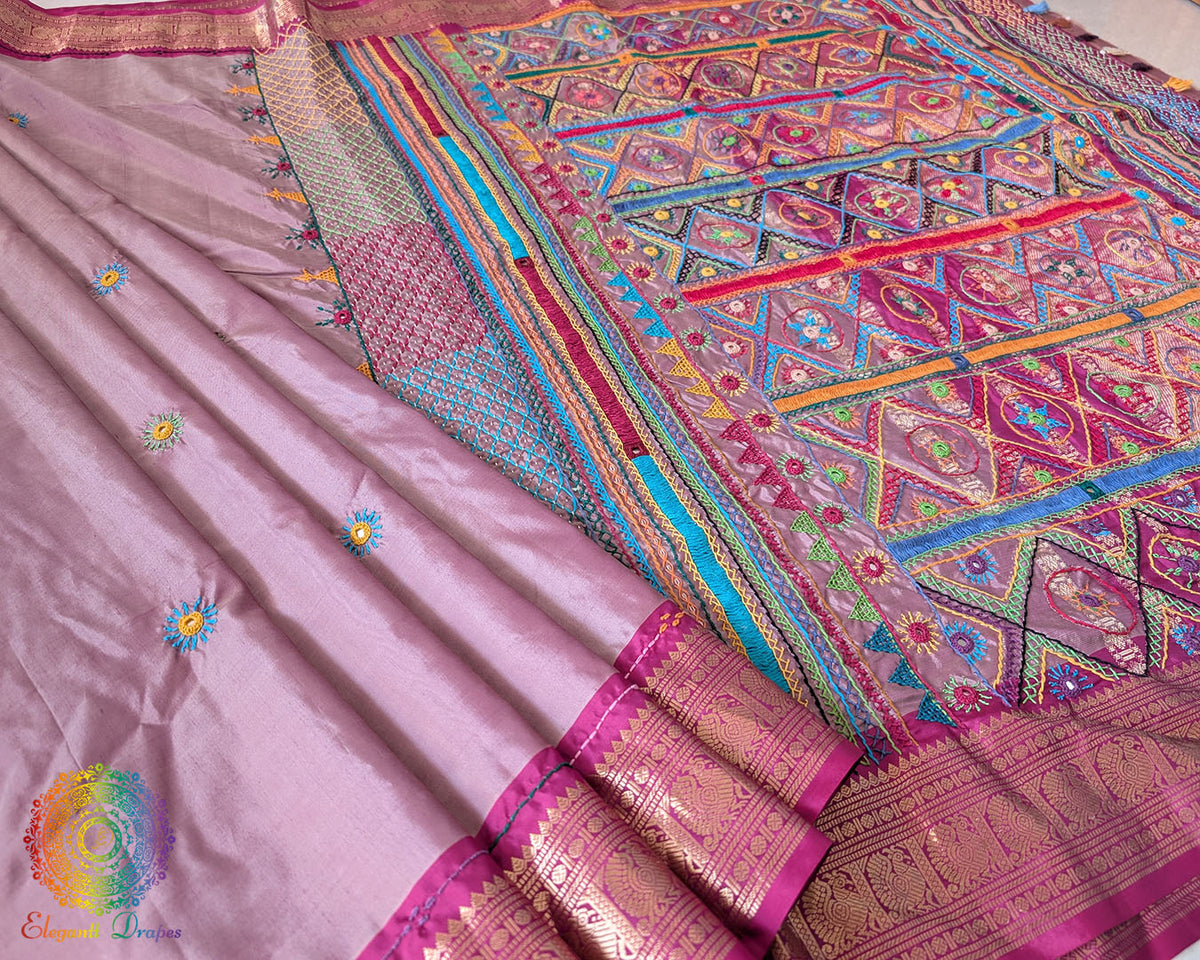 Mauve pure Kanjivaram silk saree with Lambani handwork pleats view