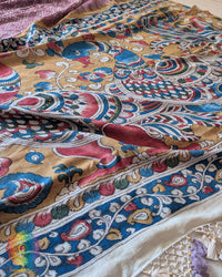 Close-up of the Kalamkari pallu with heavy tassels on the Mauve Bandhani Kalamkari Muga Silk Saree