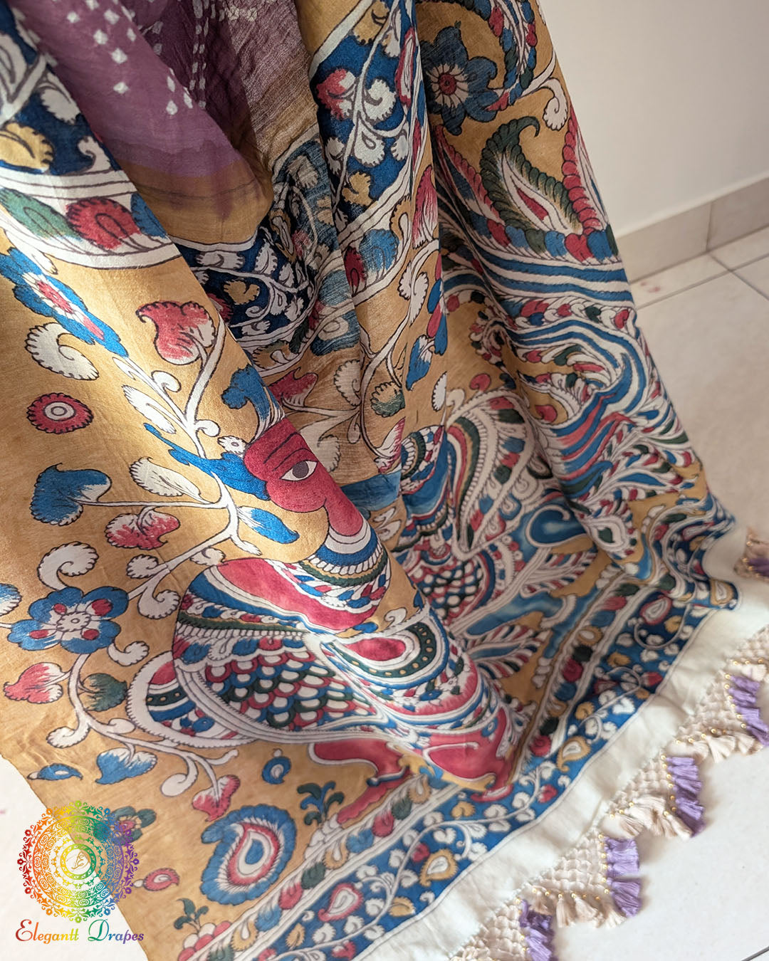 Detailed view of the border on the Mauve Bandhani Kalamkari Muga Silk Saree