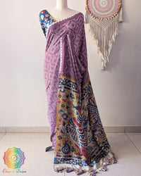 Mauve Bandhani Kalamkari Muga Silk Saree showcased on a mannequin highlighting its elegant drape and traditional craftsmanship