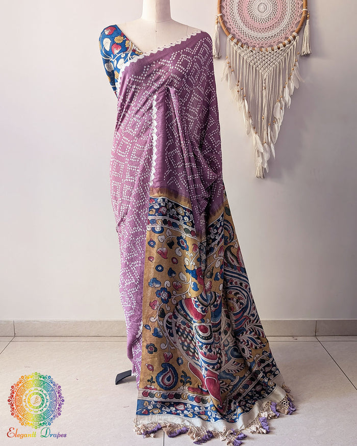 Mauve Bandhani Kalamkari Muga Silk Saree showcased on a mannequin highlighting its elegant drape and traditional craftsmanship