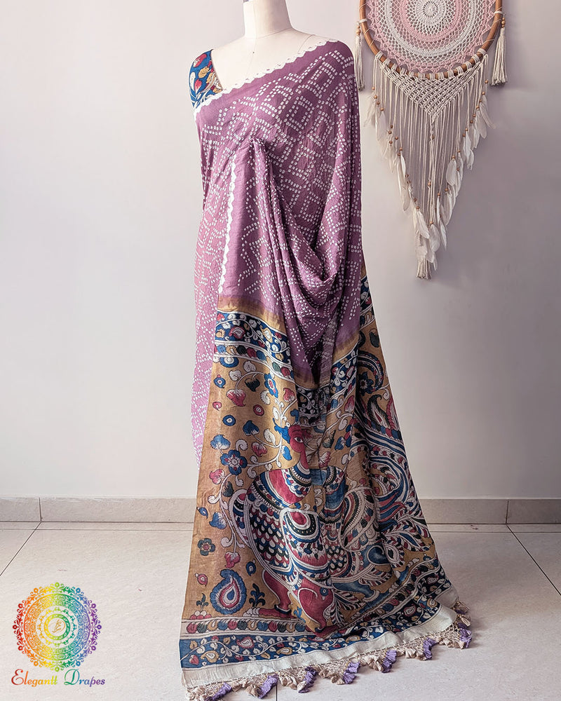 Side view of the Mauve Bandhani Kalamkari Muga Silk Saree showcasing the graceful silhouette and rich Muga Silk texture