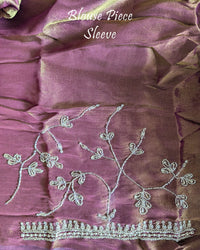 Matching blouse piece with coordinated Cutdana, pearl, and zardozi hand embroidery