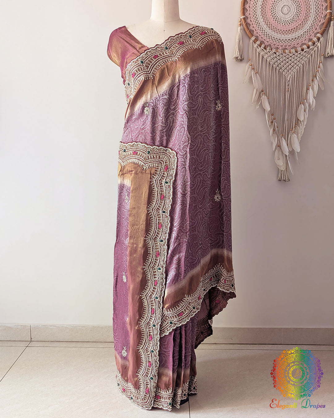 Full drape of Mauve Soft Tissue Silk saree showcasing elegant handcrafted border and luminous sheen