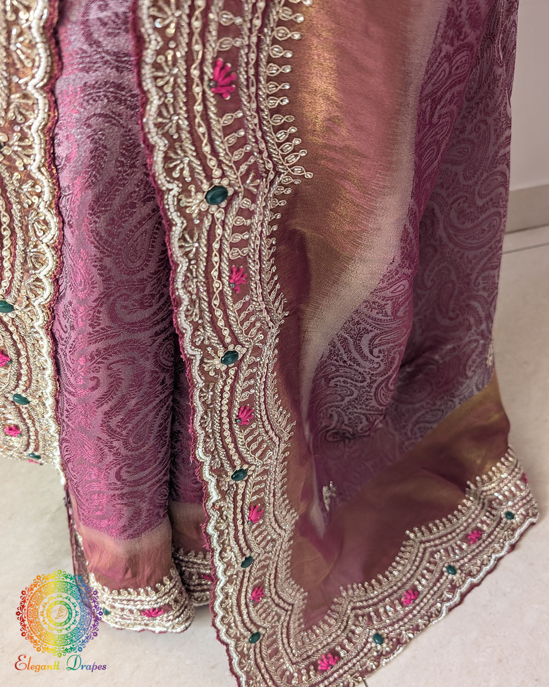 Close-up of the scalloped border featuring intricate Cutdana, pearl, and zardozi hand embroidery