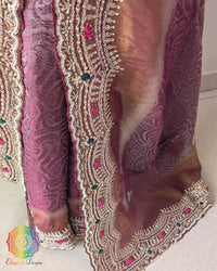 Close-up of the scalloped border featuring intricate Cutdana, pearl, and zardozi hand embroidery