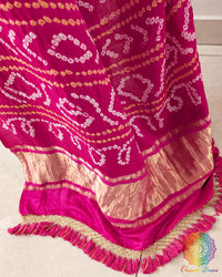 Rani Pink Gharchola Pallu with Bandhani detailing on Off White Gajji Silk Saree