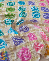Close-up of Multicolor Bandhani motifs on Off White Gajji Silk Saree