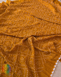 Close-up of Bandhani detailing on Mustard Yellow Gajji Silk Dupatta