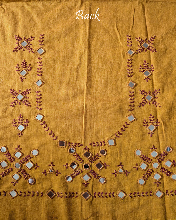Back view of the Mustard Kala Cotton Kutch Mirror Handwork blouse piece, showcasing detailed Kutch embroidery and real mirrors arranged in a decorative handcrafted design.