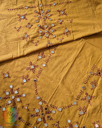Mustard Kala Cotton Kutch Mirror Handwork blouse piece featuring traditional thread embroidery and real mirror embellishments, suitable for customised ethnic blouse stitching.