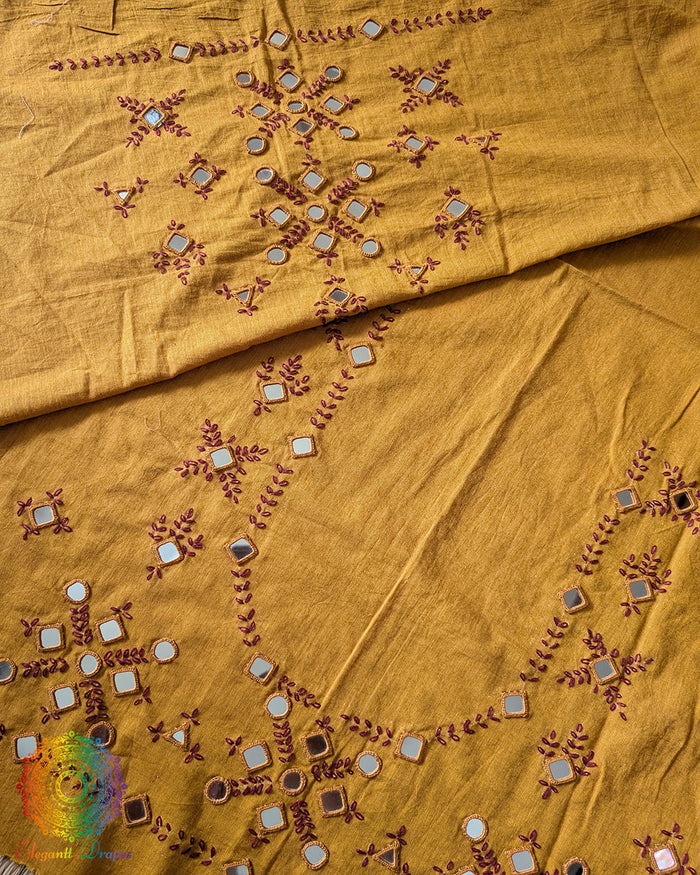 Mustard Kala Cotton Kutch Mirror Handwork blouse piece featuring traditional thread embroidery and real mirror embellishments, suitable for customised ethnic blouse stitching.