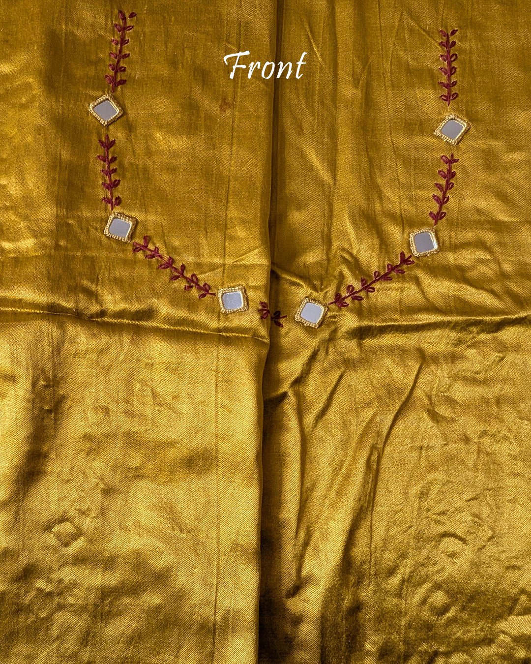 Close-up of Kutch mirror work on front neckline of Mustard Mashru Silk Blouse Piece