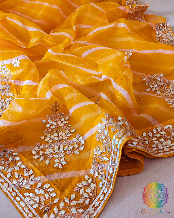 Mustard Orange Organza Leheria Saree – Detailed body view highlighting the delicate Leheria waves and intricate Kachha Gota Handwork across the Organza fabric