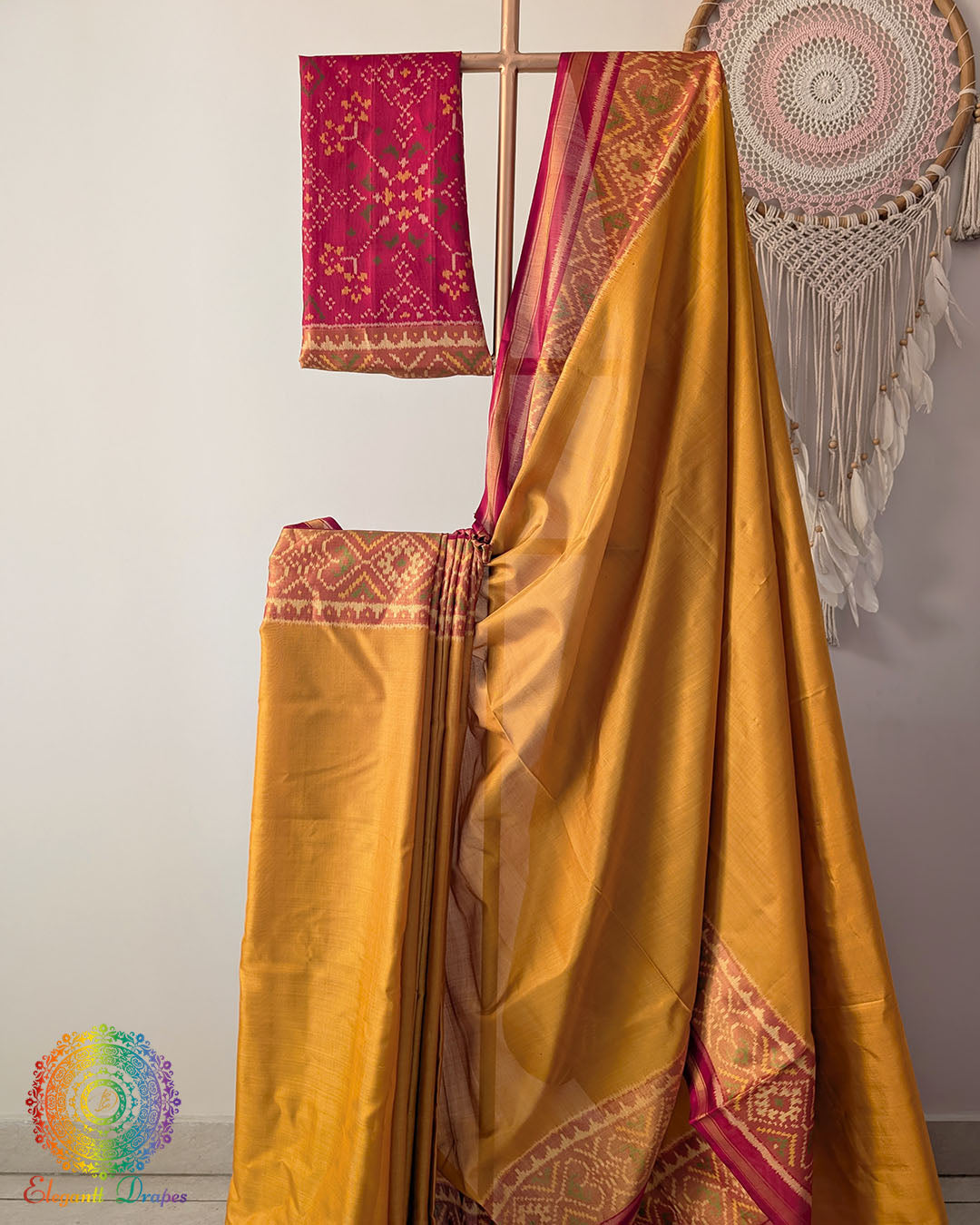 Close up of traditional Rajkot Patola weaving on mustard pure mulberry silk saree