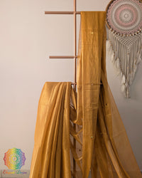Close up of mustard yellow Bengal mul tissue saree with sequins work