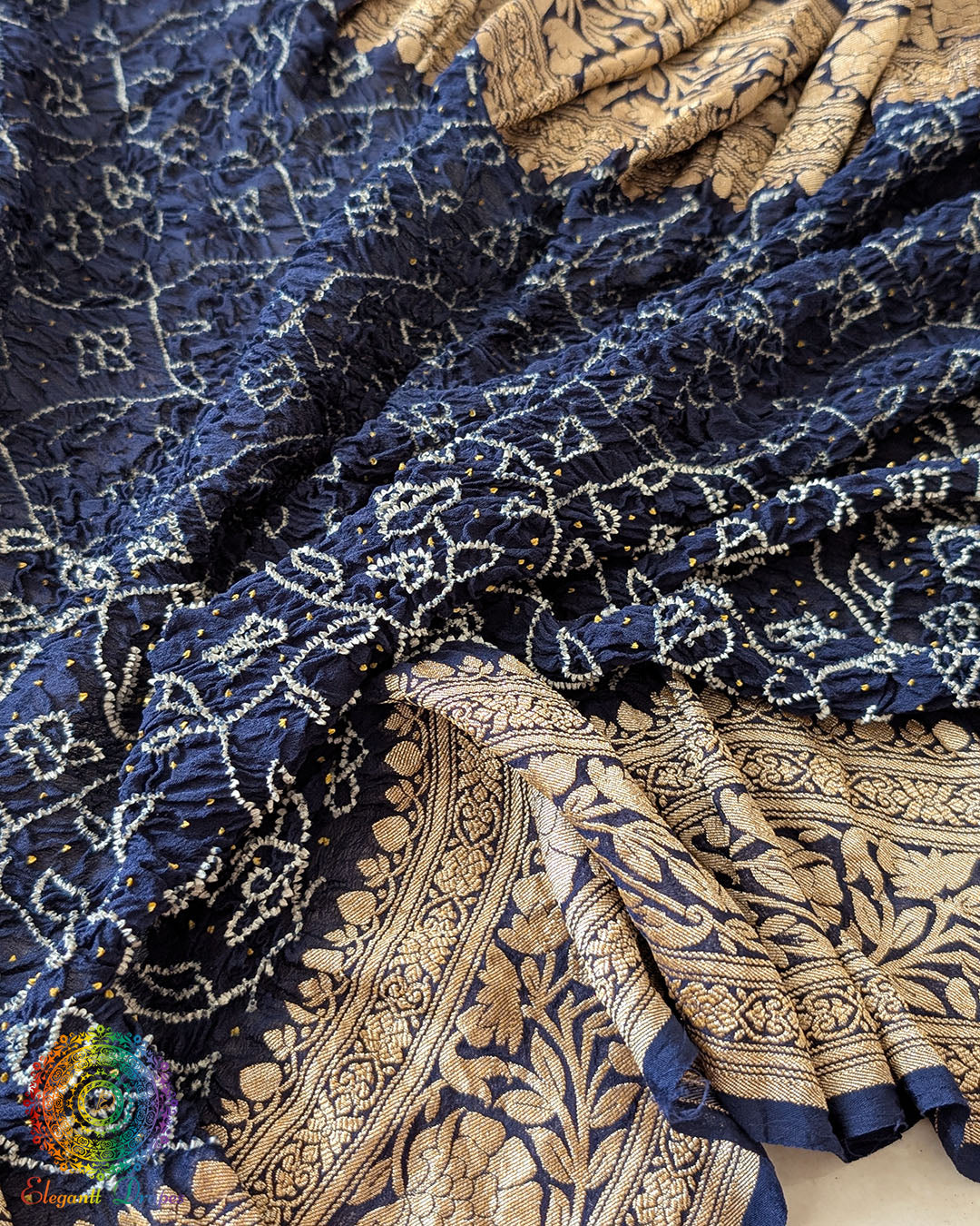 Close-up of Rai Bandhej detailing on Navy Blue Banarasi Khaddi Georgette Dupatta