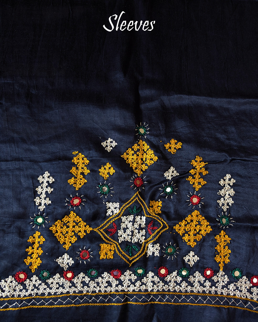 Sleeve embroidery detail on navy blue Bavadiya tribe kutch handwork blouse fabric
