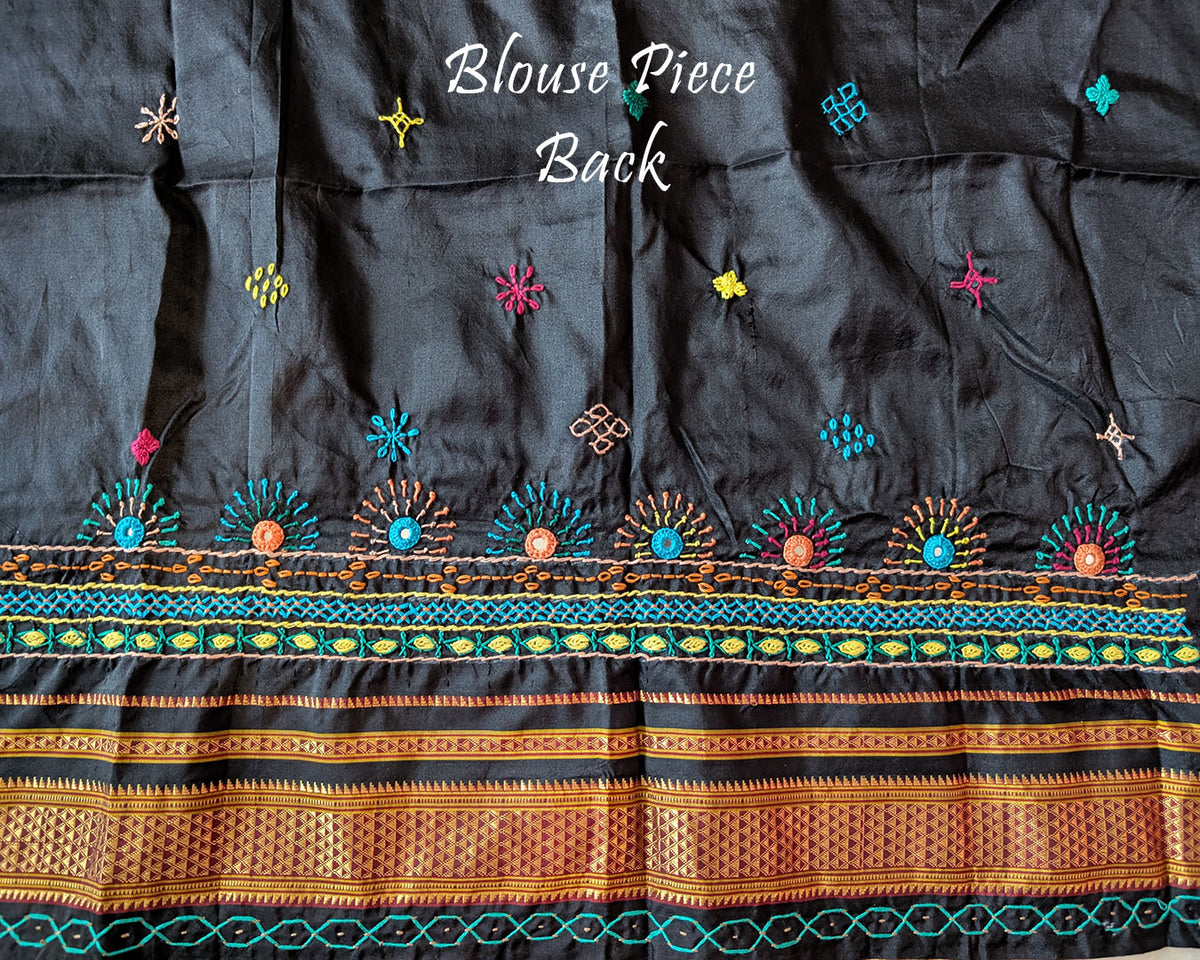 Matching blouse back showcasing traditional Lambani hand embroidery work