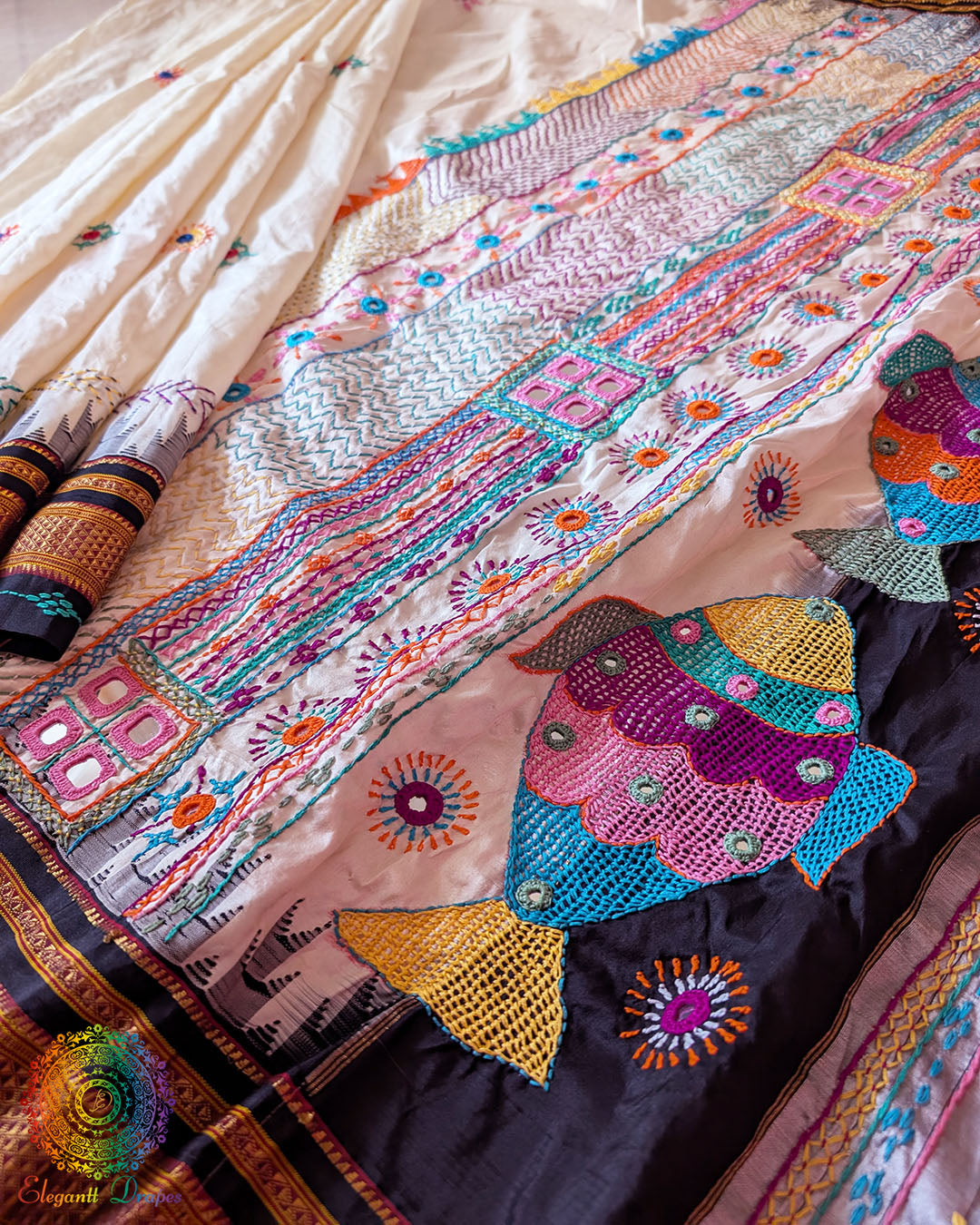 Black border detail with intricate Lambani hand embroidery on Ilkal silk saree