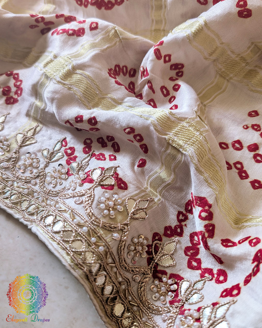 Close-up of Gota Patti embellishment on Ivory White Gajji Silk Gharchola Saree