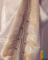 Off white gold soft tissue silk cutdana handwork saree border detail