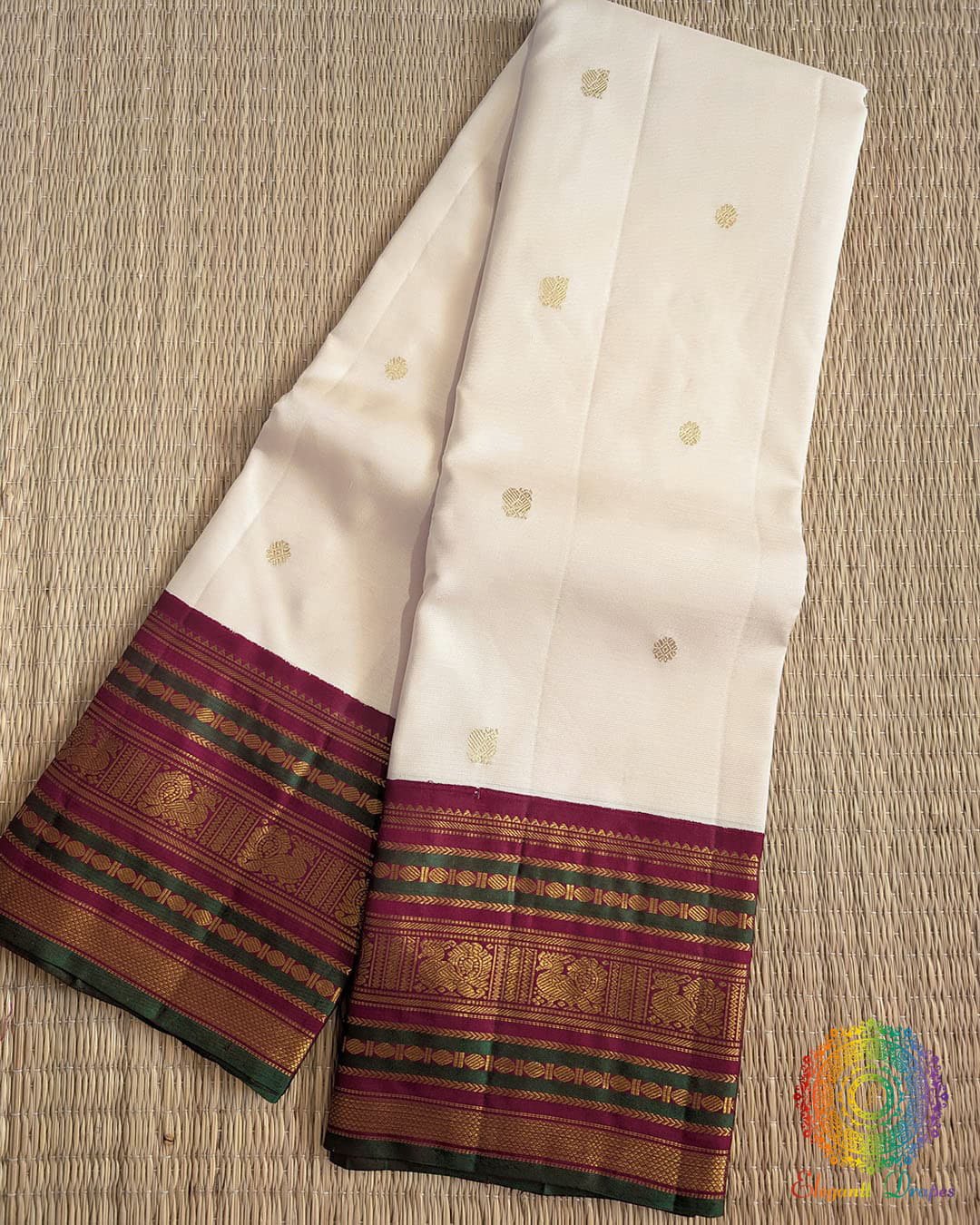Off White Pure Kanjivaram Silk Saree with Green and Deep Red Border Folded View