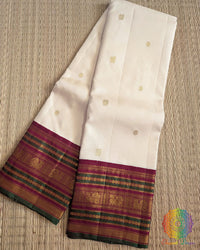Off White Pure Kanjivaram Silk Saree with Green and Deep Red Border Folded View