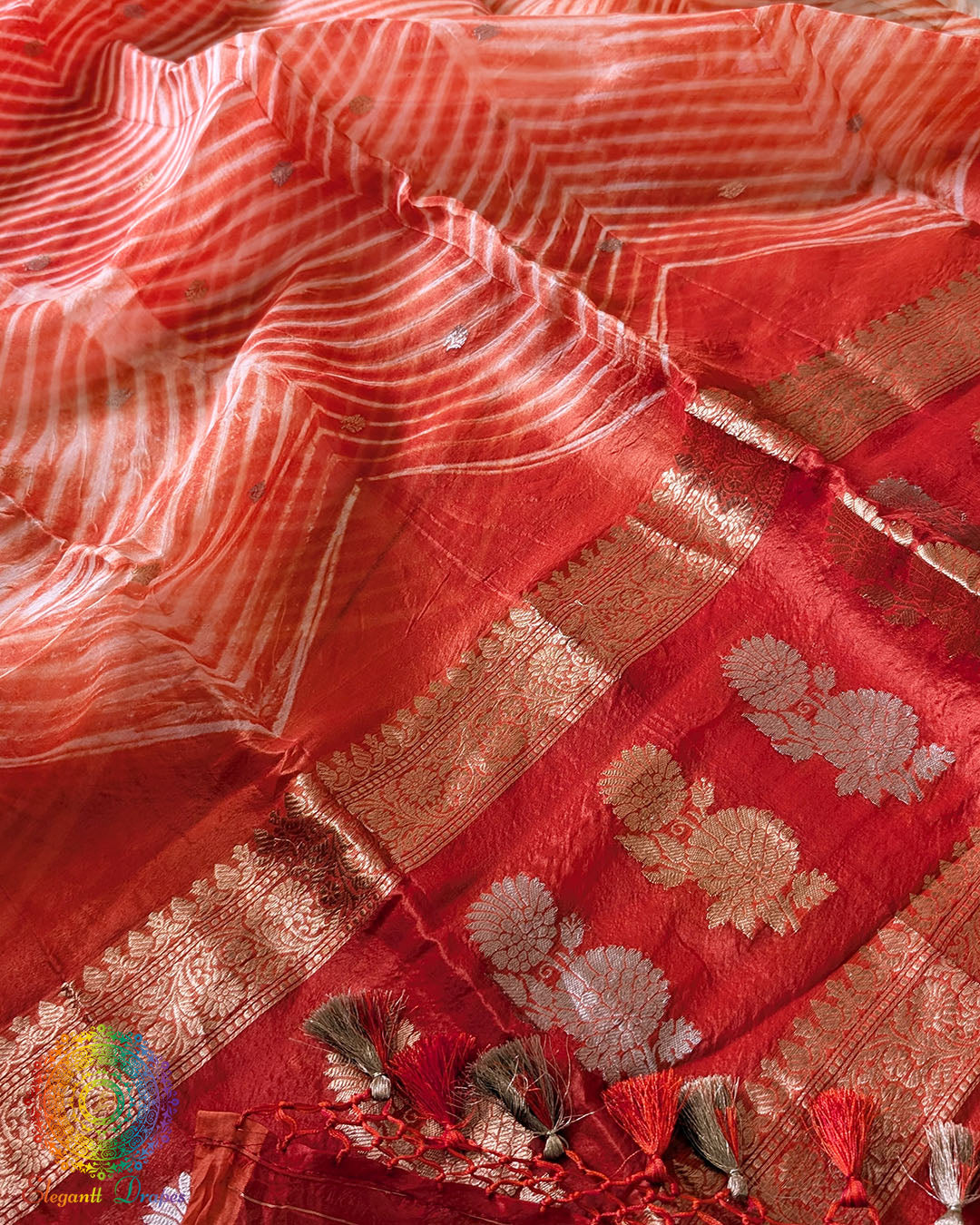 Close-up of Banarasi Handloom weave on Orange Kora Silk Dupatta