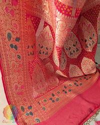 Detailed view of woven meenakari detailing on Banarasi bandhani saree