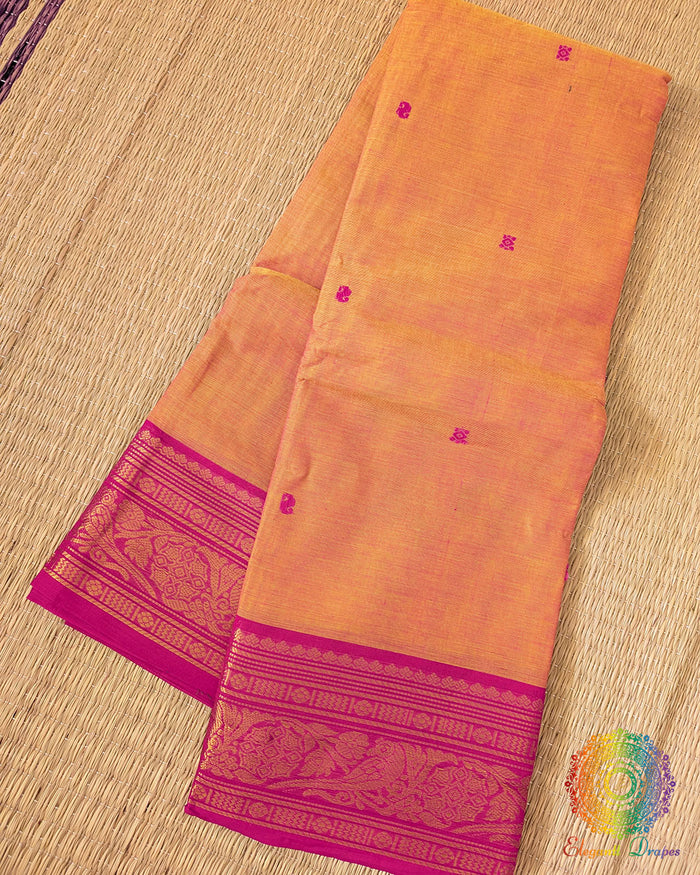 Orange Kanchi cotton saree folded view showing pink contrast border