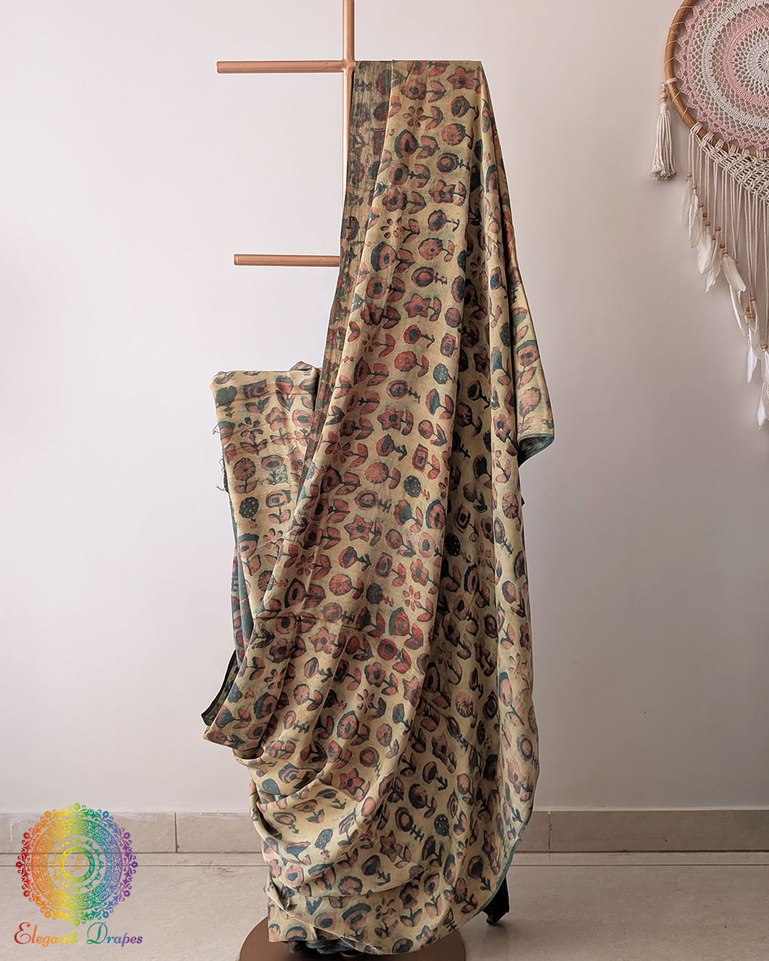 Pale Yellow Modal Tussar Saree draped with Pomegranate Nashpal dye