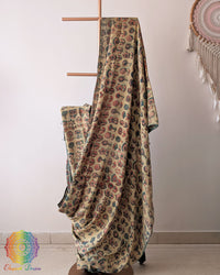 Pale Yellow Modal Tussar Saree draped with Pomegranate Nashpal dye