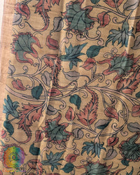 Close-up of authentic hand-painted Kalamkari artwork highlighting the rich texture and natural sheen of Pure Tussar Silk