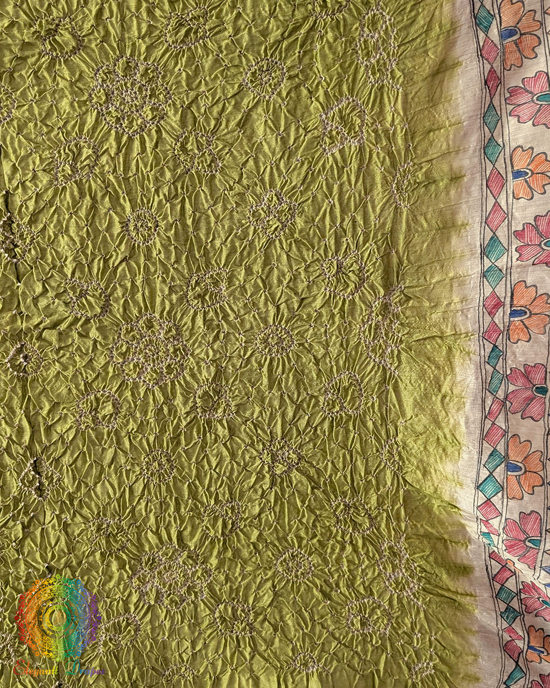 Detailed Bandhani pattern on the Pastel Green Muga Silk Dupatta