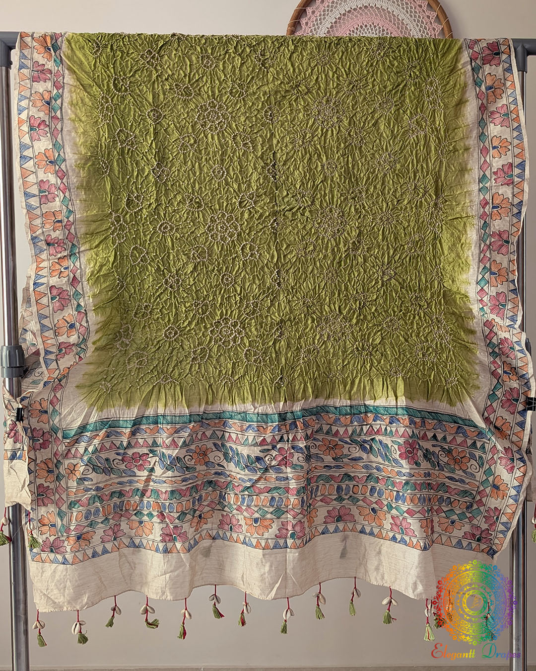 Pastel Green Muga Silk Dupatta with Bandhani body and hand-painted Madhubani artwork border