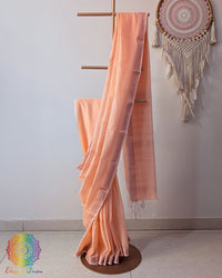 Peach Bengal cotton saree with zari border on mannequin showing full drape