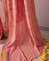 Close-up of detailed threadwork on the pallu of Peach Mul Cotton Saree