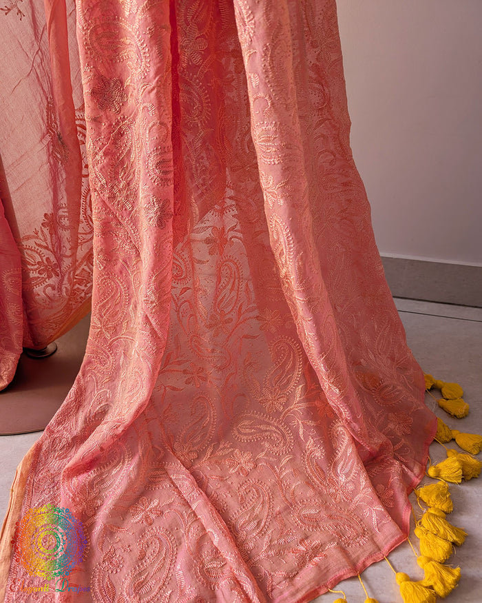 Close-up of detailed threadwork on the pallu of Peach Mul Cotton Saree