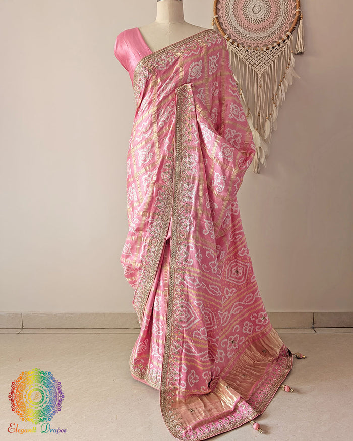 Peach gaji silk Gharchola saree laid open showing gota patti detailing