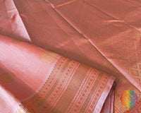 Detailed view of the woven 2-Gram Gold Zari border on the Pastel Peach Pure Kanjivaram Silk Saree