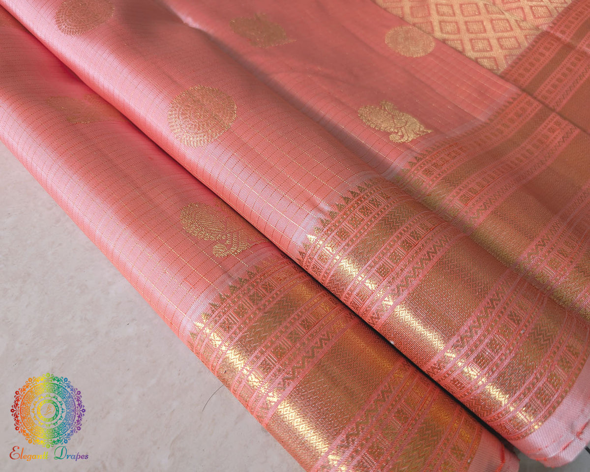 Pleats of the Pastel Peach Pure Kanjivaram Silk Saree highlighting its graceful drape and luxurious silk texture