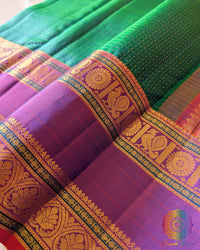 Close-up of 2-Gram Zari border on Peacock Green Pure Kanjivaram Silk Saree