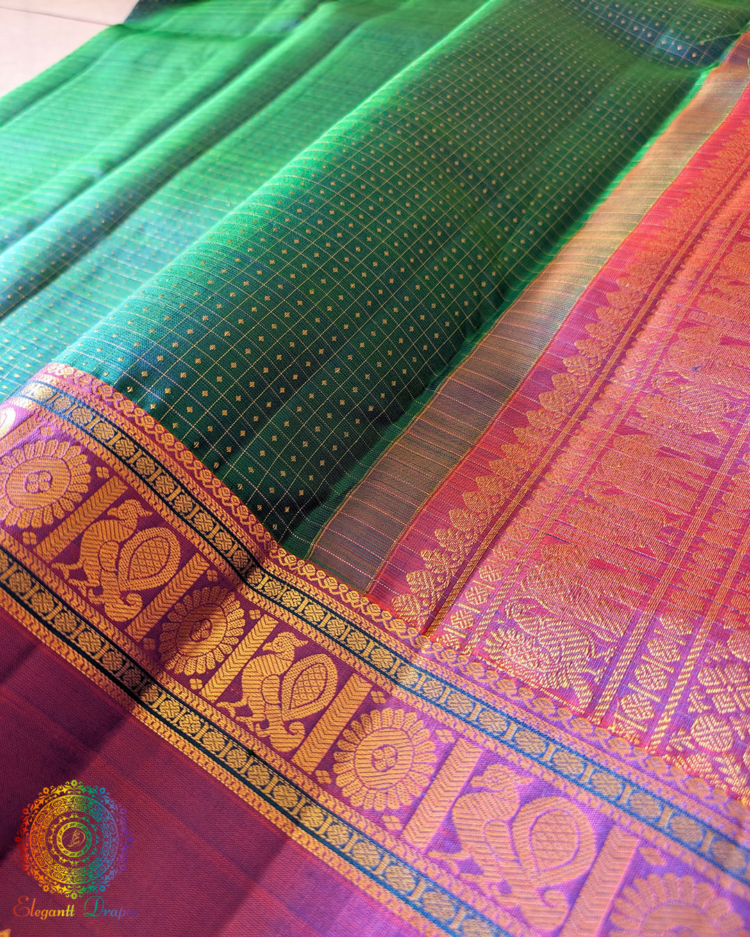 Close-up of traditional zari motifs on Peacock Green Kanjivaram Silk Saree